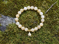 Bracelet d'intention - Ailes de lumière (Calcite orange)